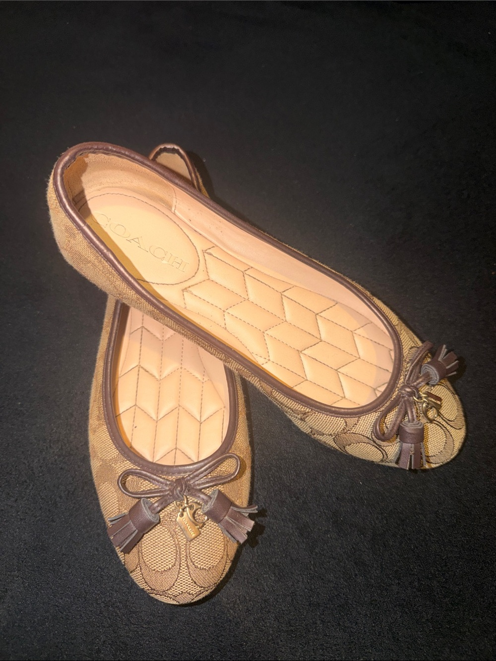 COACH Tan Signature Canvas Bow Tassel Ballet Flats